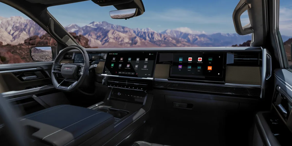 An Interior View of the GMC Sierra 1500 Dashboard with a Wide Infotainment Screen and Mountain View