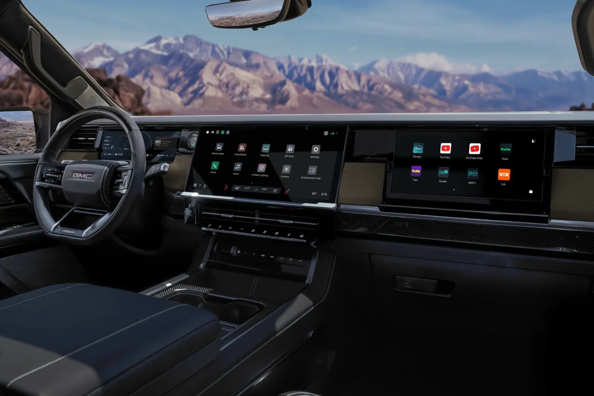 An Interior View of the GMC Sierra 1500 Dashboard with a Wide Infotainment Screen and Mountain View